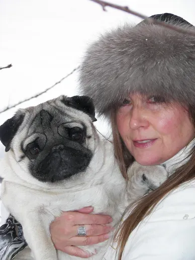 Nicolette with a pug companion